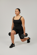 Samoan Model Lunge Pose Black Dumbbells